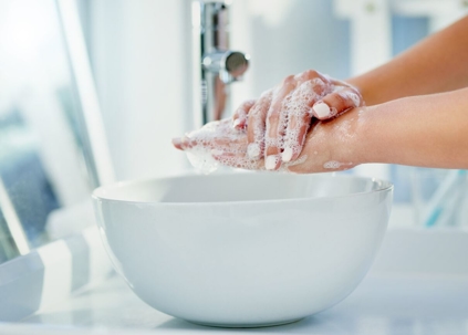 Person Washing Hands